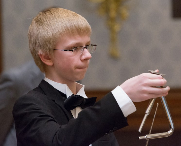 Un joueur de triangle Par Philadelphia Youth Orchestra from USA — 129, CC BY-SA 2.0 Un joueur de triangle Par Philadelphia Youth Orchestra from USA — 129, CC BY-SA 2.0